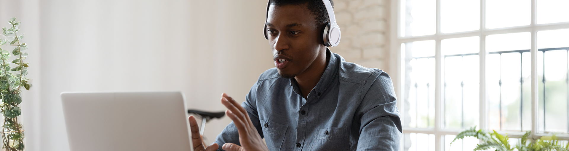 person talking online on laptop